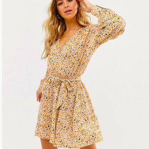 ASOS mini wrap front dress with statement sleeve in ditsy print